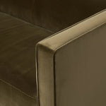 Featuring Phillip Left Arm Facing 2-Piece Sectional by Four Hands at Amethyst Home. A clean, angular sectional in an eye-catching color. Upholstered in an olive cotton blend, with blind stitching along the seat and back cushions. The slight pronounced seat cushion creates an illusion of being loose, but is actually a fixed cushion with expert tailoring. A pip. Amethyst Home provides interior design, new home construction design consulting, vintage area rugs, and lighting in the Houston metro area.