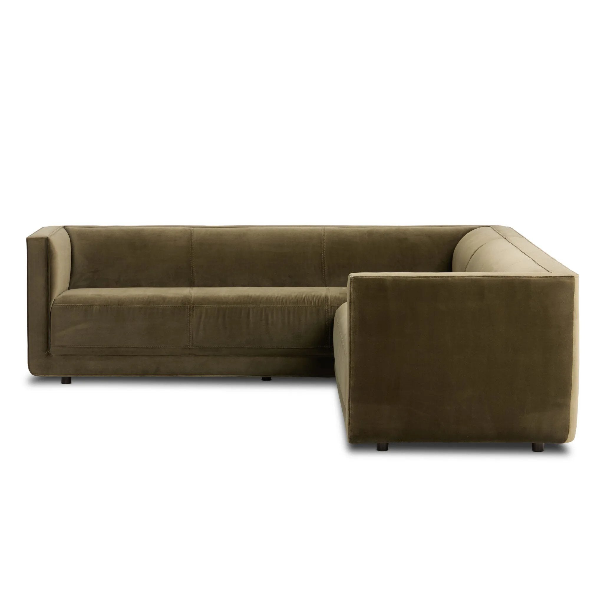 A clean, angular sectional in an eye-catching color. Upholstered in an olive cotton blend, with blind stitching along the seat and back cushions. The slight pronounced seat cushion creates an illusion of being loose, but is actually a fixed cushion with expert tailoring. A piping channel detail gives the arm a finished look Amethyst Home provides interior design, new home construction design consulting, vintage area rugs, and lighting in the Washington metro area.