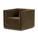 Featuring Phillip Surrey Olive Swivel Chair by Four Hands at Amethyst Home. Style meets substance in this olive cotton-blend swivel chair. Blind stitching along the seat and back cushions create a polished complement to the heritage frame. The slight pronounced seat cushion creates an illusion of being loose, but is actually a fixed cushion with expert t. Amethyst Home provides interior design, new home construction design consulting, vintage area rugs, and lighting in the Laguna Beach metro area.
