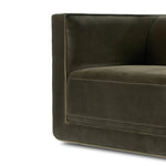 Featuring Phillip Surrey Olive Swivel Chair by Four Hands at Amethyst Home. Style meets substance in this olive cotton-blend swivel chair. Blind stitching along the seat and back cushions create a polished complement to the heritage frame. The slight pronounced seat cushion creates an illusion of being loose, but is actually a fixed cushion with expert tai. Amethyst Home provides interior design, new home construction design consulting, vintage area rugs, and lighting in the Scottsdale metro area.