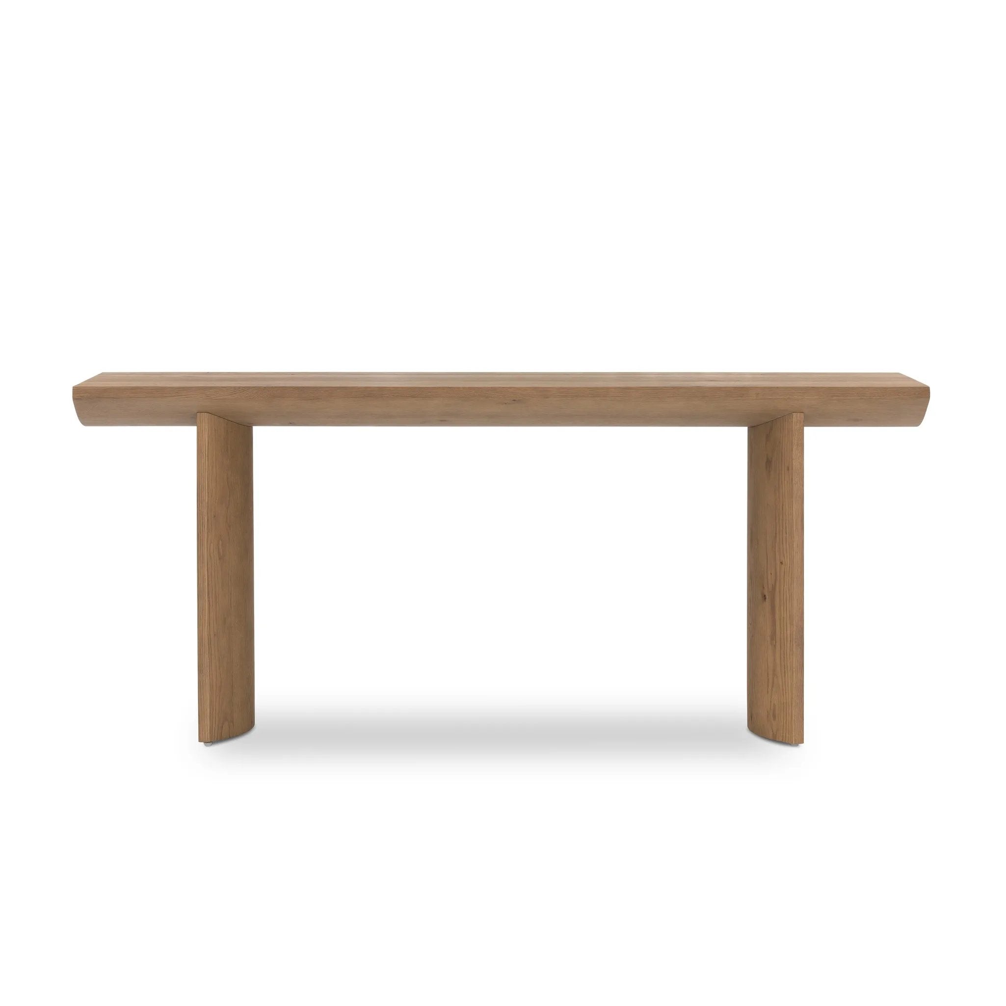 A shape-driven console table made from thick-cut oak veneer features overscale proportions and half-moon shaping, with a warm grey-brown finish Amethyst Home provides interior design, new home construction design consulting, vintage area rugs, and lighting in the Austin metro area.