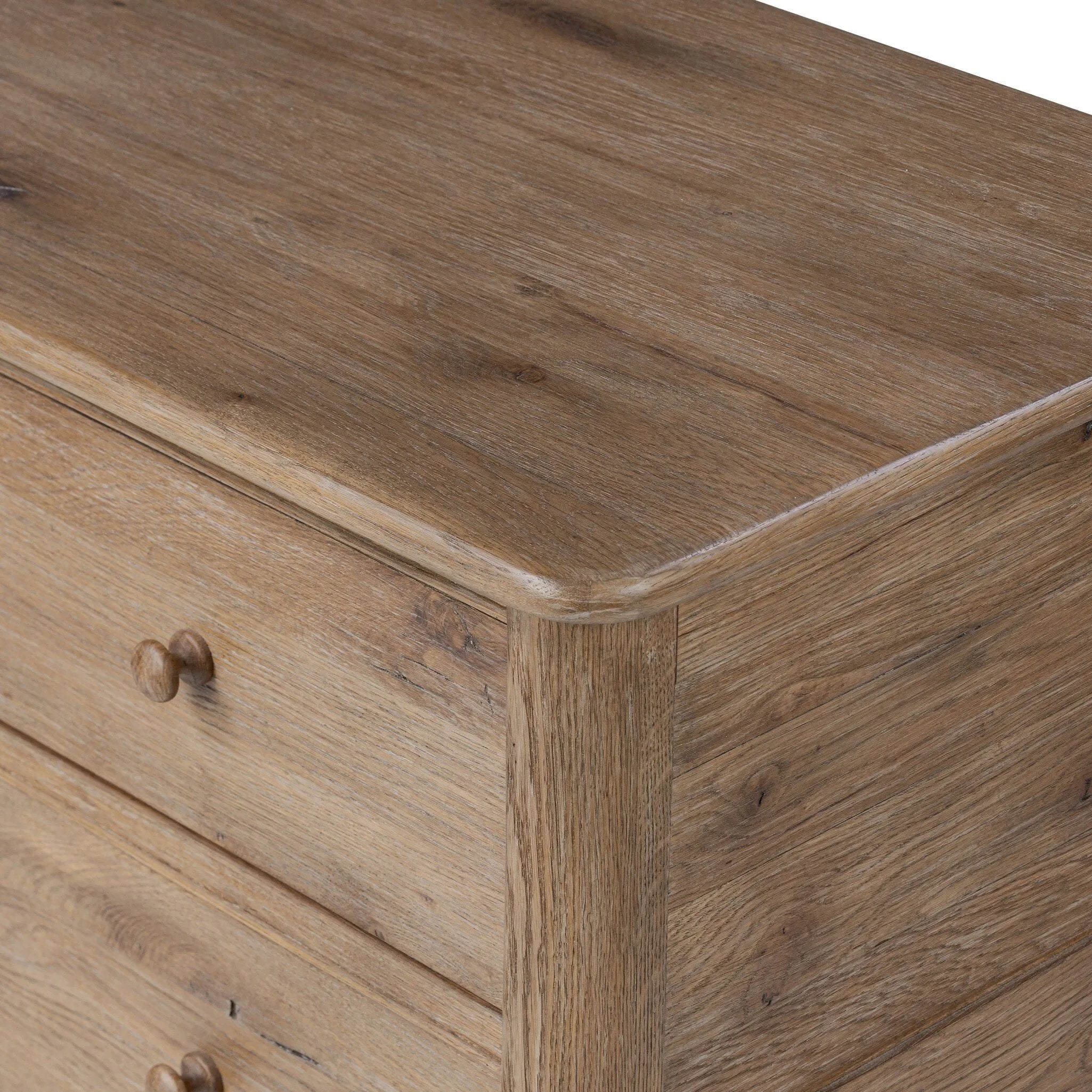 A classic chest stores in everlasting style. Crafted with heavy weathered oak with natural cracks and graining, the front has beading around the drawers for an heirloom appeal. It's finished in a tonal brown, with turned wood hardware Amethyst Home provides interior design, new home construction design consulting, vintage area rugs, and lighting in the Washington metro area.