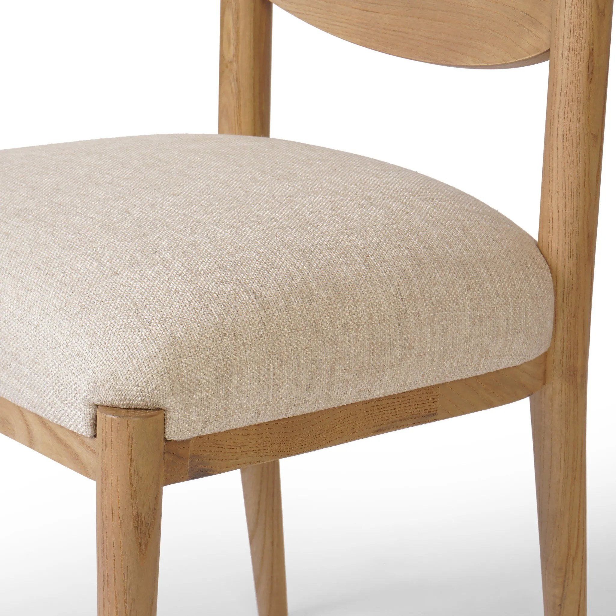 A celebration of simplicity. Natural nettlewood frames a comfortable linen-blend seat, while a subtle arc at the backrest's base softens clean, tapered lines. Performance fabrics are specially created to withstand spills, stains, high traffic and wear, ensuring long-term comfort and unmatched durability Amethyst Home provides interior design, new home construction design consulting, vintage area rugs, and lighting in the Park City metro area.