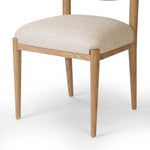 A celebration of simplicity. Natural nettlewood frames a comfortable linen-blend seat, while a subtle arc at the backrest's base softens clean, tapered lines. Performance fabrics are specially created to withstand spills, stains, high traffic and wear, ensuring long-term comfort and unmatched durability Amethyst Home provides interior design, new home construction design consulting, vintage area rugs, and lighting in the San Diego metro area.