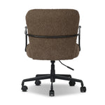 Work in comfort and style with this texture-driven desk chair. Black hammered and forged iron arms frame a seat and back upholstered in a textured weave  fabric. Performance fabrics are specially created to withstand spills, stains, high traffic and wear, ensuring long-term comfort and unmatched durability. Amethyst Home provides interior design, new home construction design consulting, vintage area rugs, and lighting in the Monterey metro area.