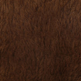 Make a statement with this texture-driven swivel chair. Made from 100% sheared sheepskin. For a unique design detail, black iron arms wrap around the back of the chair and have been hammered for even more texture. A 360-swivel base is inset for a clean look. Amethyst Home provides interior design, new home construction design consulting, vintage area rugs, and lighting in the Boston metro area.