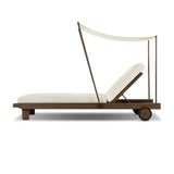 Drawing inspiration from antique rickshaws, this outdoor chaise features wheels and a built-in handle at the front for easy mobility. The adjustable and removable shade canopy offers customizable sun protection, with style. Cover or store inside during inclement weather and when not in use. Amethyst Home provides interior design, new home construction design consulting, vintage area rugs, and lighting in the Winter Garden metro area.