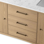 A simple transitional shape designed to function across styles. This bath vanity nods to heritage designs with the softly shaped backsplash, dowel legs, rounded corners and arch frame detail, finished with mixed hardware for added visual interest. Finished with a bath-safe sealant for moisture resistance. Amethyst Home provides interior design, new home construction design consulting, vintage area rugs, and lighting in the Des Moines metro area.