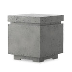 This outdoor propane tank enclosure pairs with fire tables for a clean, seamless look. Made from glass-reinforced concrete, each piece is naturally finished with deep tones of pewter and dark grey. It can act as an end table with its lid on, and has cutouts at the base for hose attachments. Amethyst Home provides interior design, new home construction design consulting, vintage area rugs, and lighting in the Nashville metro area.