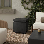 This outdoor propane tank enclosure pairs with fire tables for a clean, seamless look. Made from glass-reinforced concrete, each piece is naturally finished with deep tones of charcoal. It can act as an end table with its lid on, and has cutouts at the base for hose attachments. Cover or store indoors during inclement weather and when not in use. Amethyst Home provides interior design, new home construction design consulting, vintage area rugs, and lighting in the Monterey metro area.