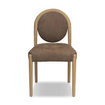 Minimal design, maximum impact. Designed with a subtle nod to midcentury modern, this dining chair features tapered legs, a thickly padded seat and a suspended seat back nestled in a soft arch frame. Crafted from solid oak and upholstered in top-grain leather Amethyst Home provides interior design, new home construction design consulting, vintage area rugs, and lighting in the San Diego metro area.
