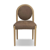 Minimal design, maximum impact. Designed with a subtle nod to midcentury modern, this dining chair features tapered legs, a thickly padded seat and a suspended seat back nestled in a soft arch frame. Crafted from solid oak and upholstered in top-grain leather Amethyst Home provides interior design, new home construction design consulting, vintage area rugs, and lighting in the San Diego metro area.
