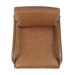 A slim seating style with timeless materials. An armless chair is fully upholstered in butterscotch top-grain leather with a subtle vintage look. Iron legs are also covered in leather, with exposed stitching along each leg. Finished with wooden armrests prime for the head of the table. Amethyst Home provides interior design, new home construction design consulting, vintage area rugs, and lighting in the Newport Beach metro area.