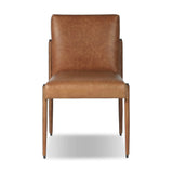 A slim seating style with timeless materials. An armless chair is fully upholstered in butterscotch top-grain leather with a subtle vintage look. Iron legs are also covered in leather, with exposed stitching along each leg.As enthusiasts of luxe design at Amethyst, we love the warm modern inspired Quill Dining Chair. Amethyst Home provides interior design, new home construction design consulting, vintage area rugs, and lighting in the Boston metro area.