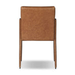 A slim seating style with timeless materials. An armless chair is fully upholstered in butterscotch top-grain leather with a subtle vintage look. Iron legs are also covered in leather, with exposed stitching along each leg.As enthusiasts of luxe design at Amethyst, we love the warm modern inspired Quill Dining Chair. Amethyst Home provides interior design, new home construction design consulting, vintage area rugs, and lighting in the Portland metro area.