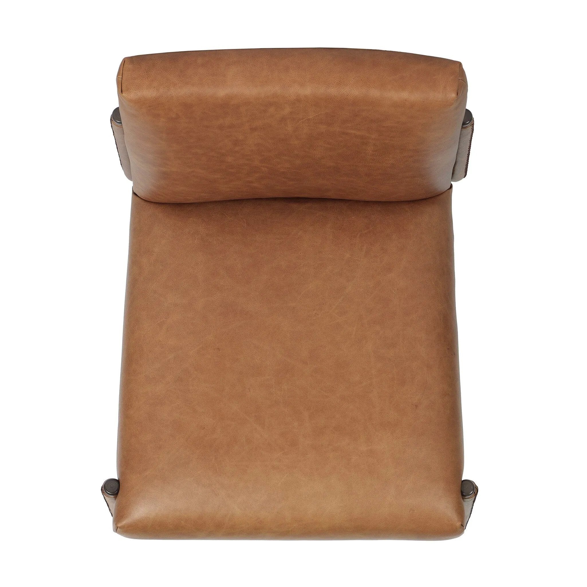 A slim seating style with timeless materials. An armless chair is fully upholstered in butterscotch top-grain leather with a subtle vintage look. Iron legs are also covered in leather, with exposed stitching along each leg.As enthusiasts of luxe design at Amethyst, we love the warm modern inspired Quill Dining Chair. Amethyst Home provides interior design, new home construction design consulting, vintage area rugs, and lighting in the Salt Lake City metro area.