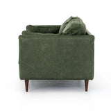 Featuring Reese Eden Sage Sofa by Four Hands at Amethyst Home. Effortlessly on-trend. Two-cushion seating of sage top-grain leather, with knife-edge pillows and welted track arms. Almond-finished legs taper for a modern touch atop mid-century influence.Overall Dimensions: 76.00"w x 35.00"d x 32.75"hWeight : 110.89 lbsMaterials: Top Grain Leather, Poplar Plywo. Amethyst Home provides interior design, new home construction design consulting, vintage area rugs, and lighting in the Houston metro area.