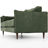 Featuring Reese Eden Sage Sofa by Four Hands at Amethyst Home. Effortlessly on-trend. Two-cushion seating of sage top-grain leather, with knife-edge pillows and welted track arms. Almond-finished legs taper for a modern touch atop mid-century influence.Overall Dimensions: 76.00"w x 35.00"d x 32.75"hWeight : 110.89 lbsMaterials: Top Grain Leather, Poplar Plywood. Amethyst Home provides interior design, new home construction design consulting, vintage area rugs, and lighting in the Omaha metro area.