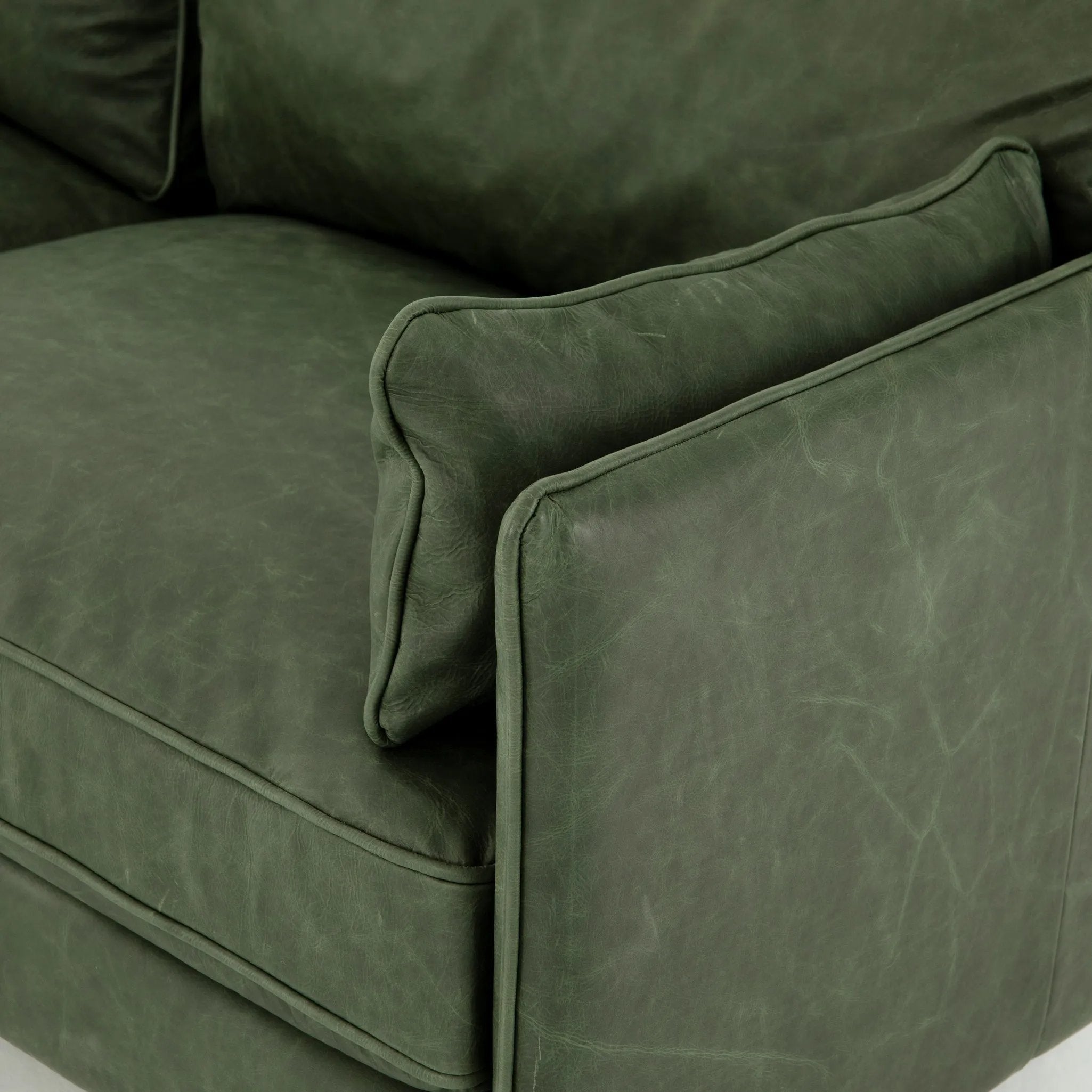 Featuring Reese Eden Sage Sofa by Four Hands at Amethyst Home. Effortlessly on-trend. Two-cushion seating of sage top-grain leather, with knife-edge pillows and welted track arms. Almond-finished legs taper for a modern touch atop mid-century influence.Overall Dimensions: 76.00"w x 35.00"d x 32.75"hWeight : 110.89 lbsMaterials: Top Grain Leather, Poplar Ply. Amethyst Home provides interior design, new home construction design consulting, vintage area rugs, and lighting in the San Diego metro area.