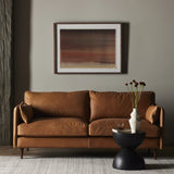 Featuring Reese Palermo Cognac Sofa by Four Hands at Amethyst Home. Effortlessly on-trend. Two-cushion seating of top-grain leather, with knife-edge pillows and welted track arms. Almond-finished legs taper for a modern touch atop midcentury influence.Overall Dimensions: 76.00"w x 35.00"d x 32.75"hWeight : 110.89 lbsMaterials: Top Grain Leather, Poplar Plywo. Amethyst Home provides interior design, new home construction design consulting, vintage area rugs, and lighting in the Portland metro area.