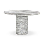 A bold, sculptural presence with movement throughout. This solid marble table features a stacked fluted base and bullnose-edged top that combine to let the natural variation of the material take center stage.As fans of clean design at Amethyst, we love the nature inspired Reeves Dining Table - River Grey Marble. Amethyst Home provides interior design, new home construction design consulting, vintage area rugs, and lighting in the Kansas City metro area.