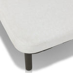 A campaign-inspired outdoor chaise transforms any space into your personal retreat. Monochromatic strap detailing wraps a sleek, minimalist frame, with a linen-like cushion upholstered in high-performance Italian fabric. Designed to elevate your outdoor space with a resort-like ease. Amethyst Home provides interior design, new home construction design consulting, vintage area rugs, and lighting in the Laguna Beach metro area.