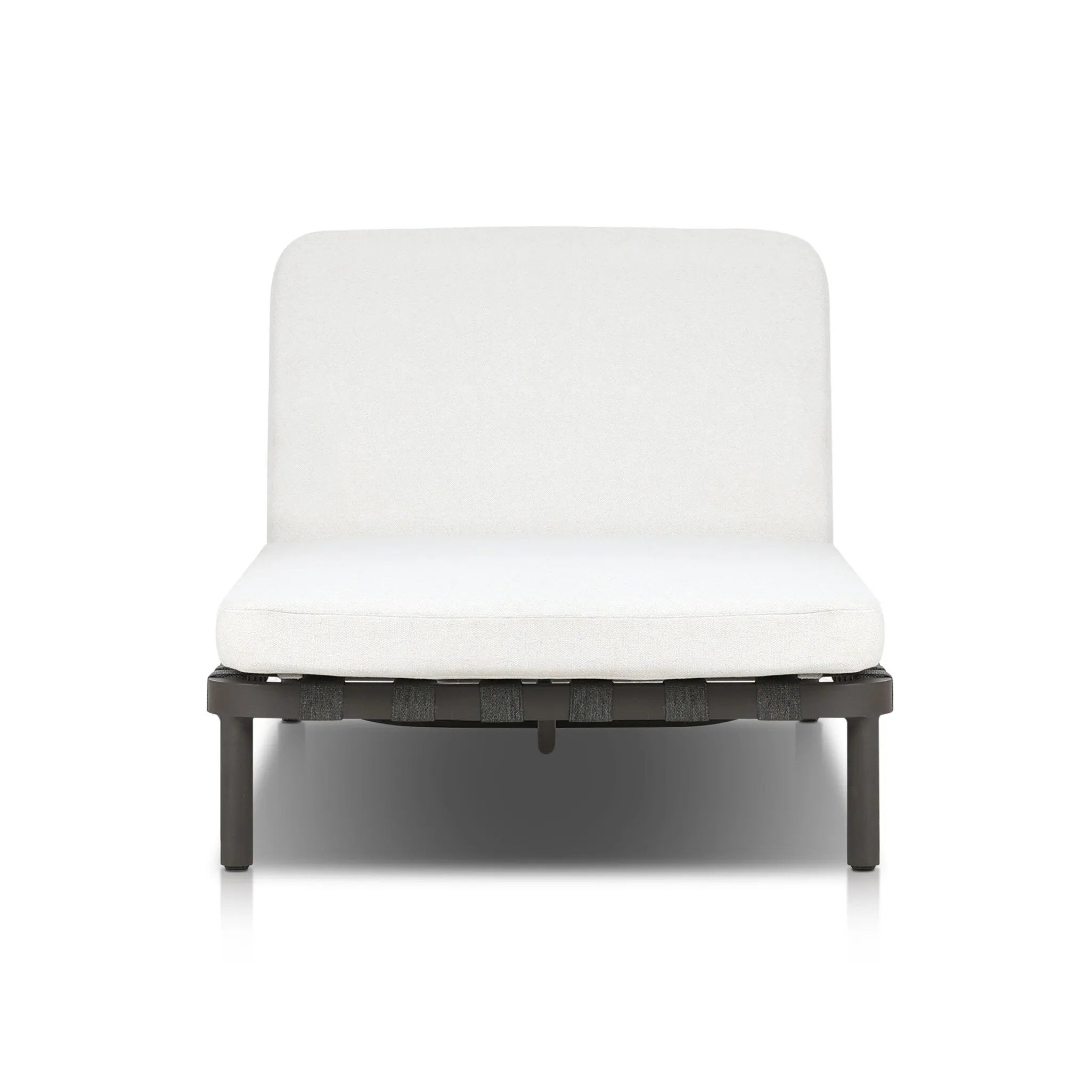 A campaign-inspired outdoor chaise transforms any space into your personal retreat. Monochromatic strap detailing wraps a sleek, minimalist frame, with a linen-like cushion upholstered in high-performance Italian fabric. Designed to elevate your outdoor space with a resort-like ease. Amethyst Home provides interior design, new home construction design consulting, vintage area rugs, and lighting in the San Diego metro area.