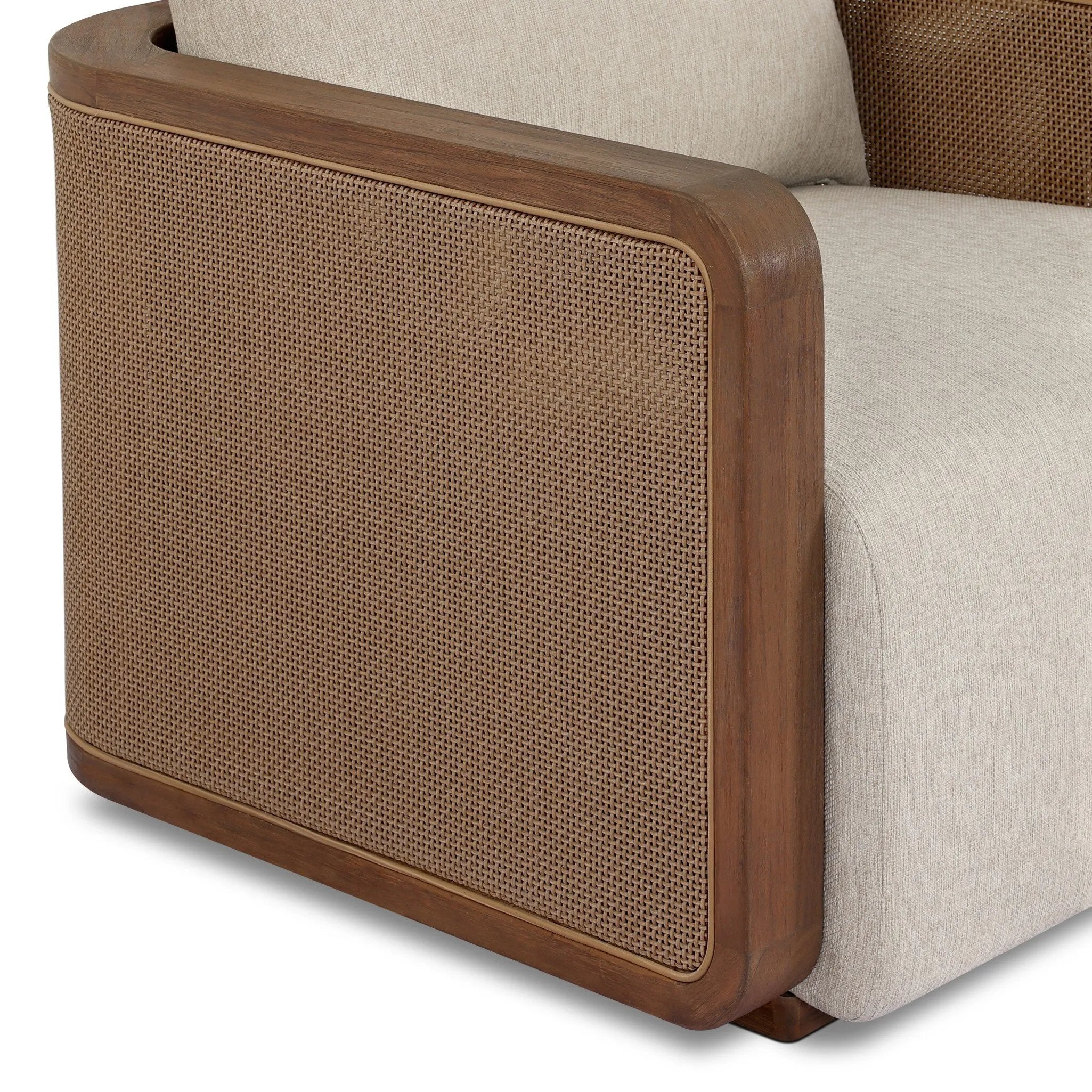 Softness is the story of this mixed material outdoor chair. With thick, sink-in cushioning and a loose pillow on the seatback, the silhouette comes together with a barrel-shaped, FSC®-certified teak frame featuring a crosshatch cane panel. Cover or store inside during inclement weather and when not in use. Amethyst Home provides interior design, new home construction design consulting, vintage area rugs, and lighting in the Des Moines metro area.