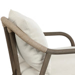 Capturing the ease of tropical ratan seating, an oversized outdoor chair is shaped from FSC-certified teak and wrapped with rush cord detailing. Exemplary woodworking is seen in the fluid lines that end with sturdy spindle legs supporting the comfortable S-spring fixed seat and loose cushion, upholstered in taupe burlap fabric. Amethyst Home provides interior design, new home construction design consulting, vintage area rugs, and lighting in the Park City metro area.