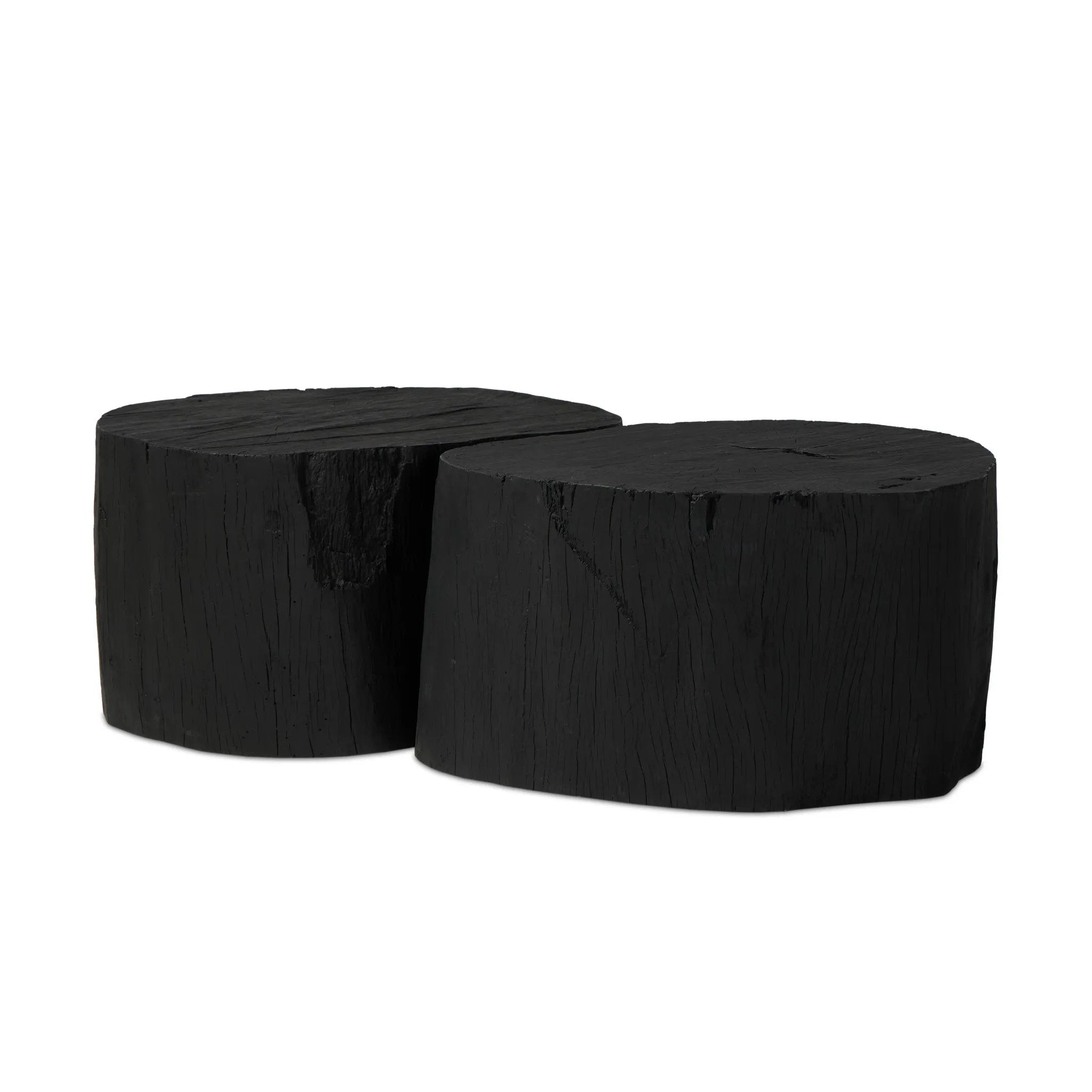 Anchor your living space with a style inspired by the beautiful simplicity of nature. Made of black-finished resin, the shape for this special piece is molded from a tree trunk, then cast in resin to recreate the same shape and texture of the trunk — talk about a true statement piece Amethyst Home provides interior design, new home construction design consulting, vintage area rugs, and lighting in the Houston metro area.