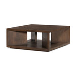 A coffee table crafted of solid mango with a warm brown finish. Simple, modern shaping to easily suit a range of styles and spaces. Great alone or paired.As lovers of organic modern aesthetics at Amethyst, we love the designer inspired Rico Coffee Table - Warm Brown Mango. Amethyst Home provides interior design, new home construction design consulting, vintage area rugs, and lighting in the Houston metro area.