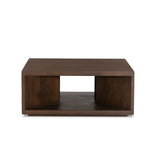 A coffee table crafted of solid mango with a warm brown finish. Simple, modern shaping to easily suit a range of styles and spaces. Great alone or paired.As lovers of organic modern aesthetics at Amethyst, we love the designer inspired Rico Coffee Table - Warm Brown Mango. Amethyst Home provides interior design, new home construction design consulting, vintage area rugs, and lighting in the Laguna Beach metro area.