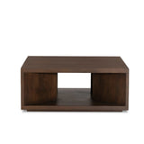 A coffee table crafted of solid mango with a warm brown finish. Simple, modern shaping to easily suit a range of styles and spaces. Great alone or paired.As lovers of organic modern aesthetics at Amethyst, we love the designer inspired Rico Coffee Table - Warm Brown Mango. Amethyst Home provides interior design, new home construction design consulting, vintage area rugs, and lighting in the Laguna Beach metro area.