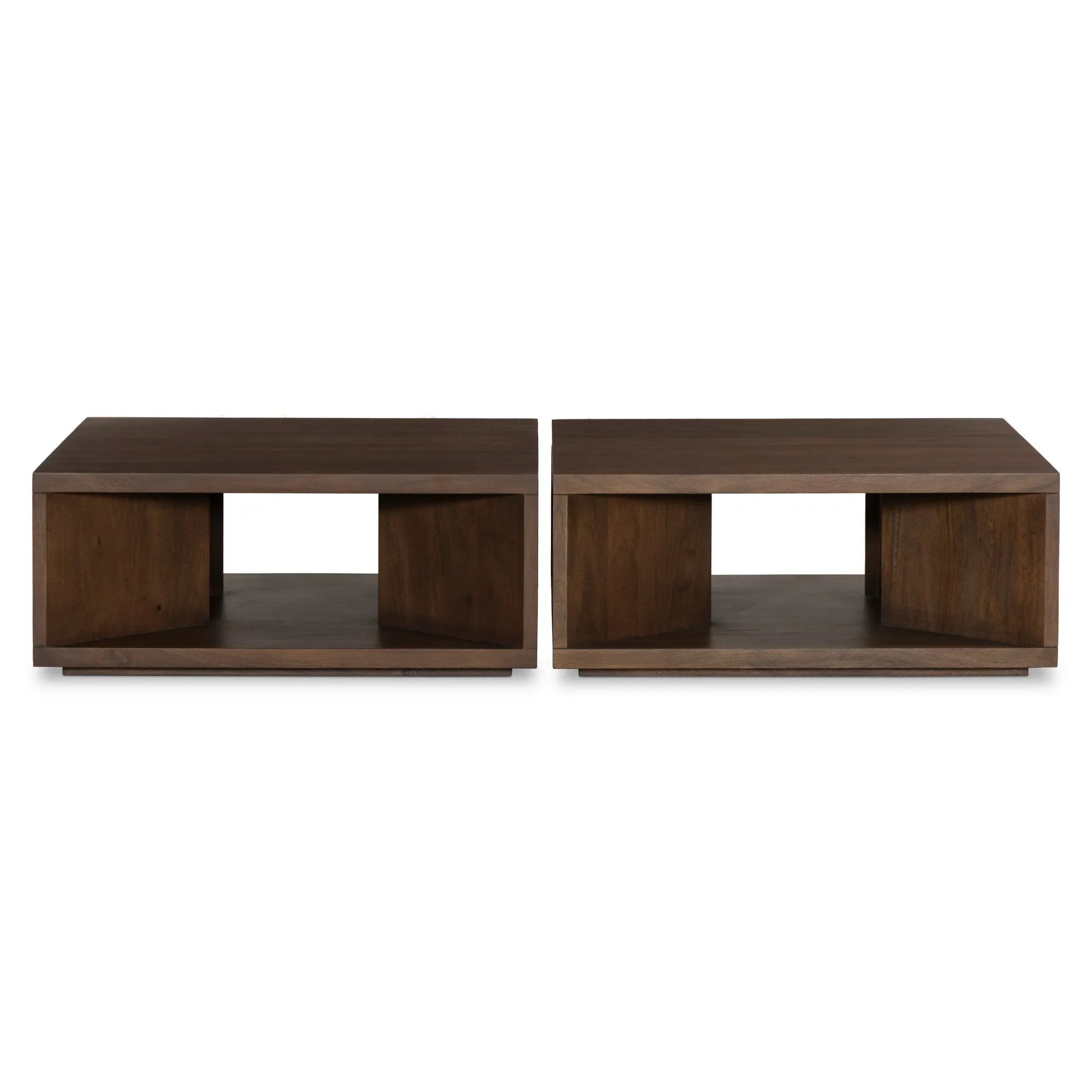 A coffee table crafted of solid mango with a warm brown finish. Simple, modern shaping to easily suit a range of styles and spaces. Great alone or paired.As lovers of organic modern aesthetics at Amethyst, we love the designer inspired Rico Coffee Table - Warm Brown Mango. Amethyst Home provides interior design, new home construction design consulting, vintage area rugs, and lighting in the Park City metro area.