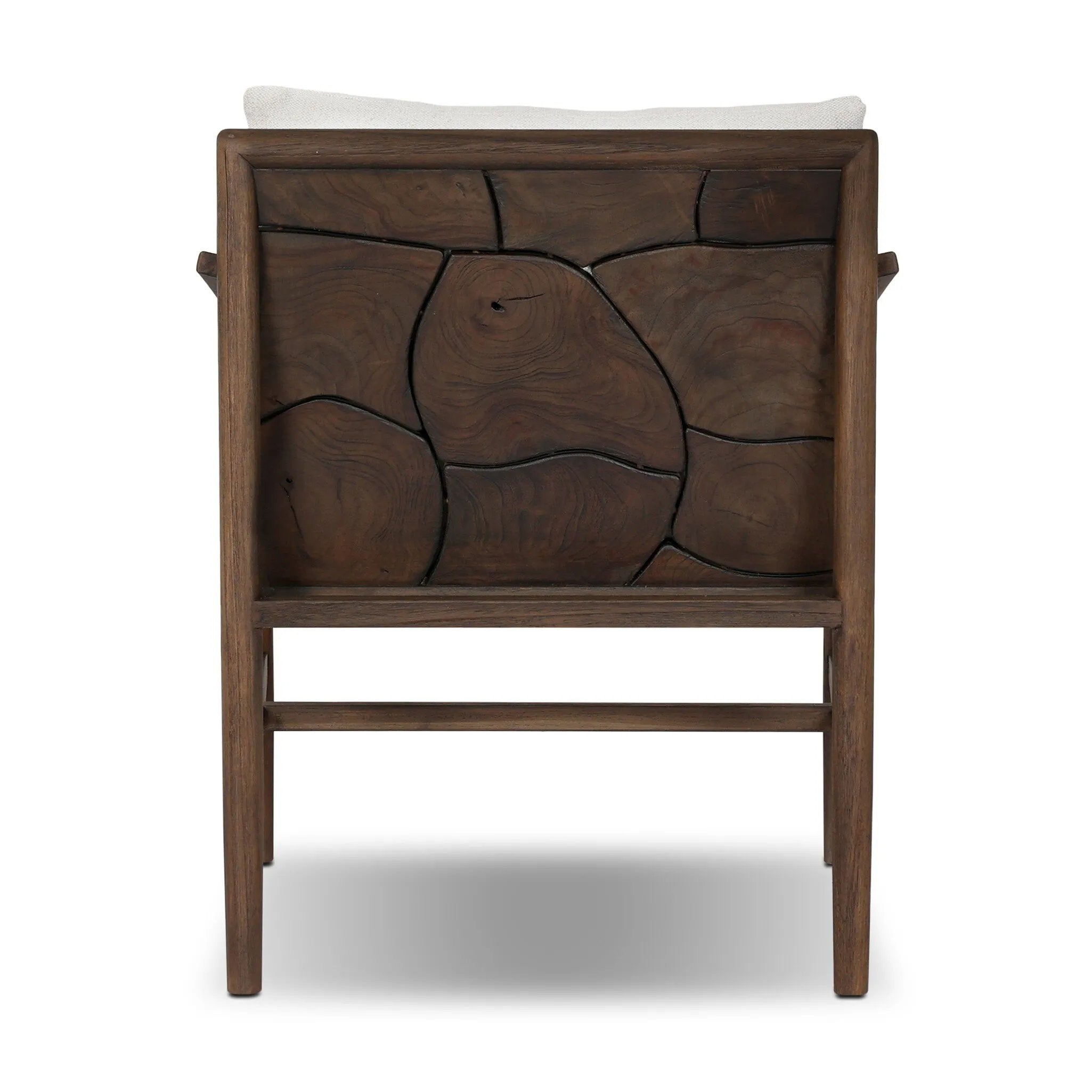 Inset panels of solid teak root are laminated to create a mosaic look against beautiful natural graining. Between angled armrests, cushioned seating is upholstered in a durable Italian fabric for an elevated look with a linen hand feel. Amethyst Home provides interior design, new home construction design consulting, vintage area rugs, and lighting in the Boston metro area.
