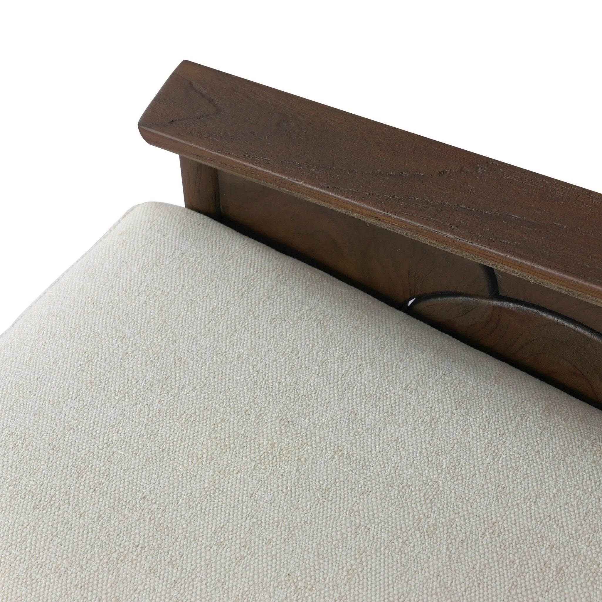 Inset panels of solid teak root are laminated to create a mosaic look against beautiful natural graining. Between angled armrests, cushioned seating is upholstered in a durable Italian fabric for an elevated look with a linen hand feel. Amethyst Home provides interior design, new home construction design consulting, vintage area rugs, and lighting in the Dallas metro area.