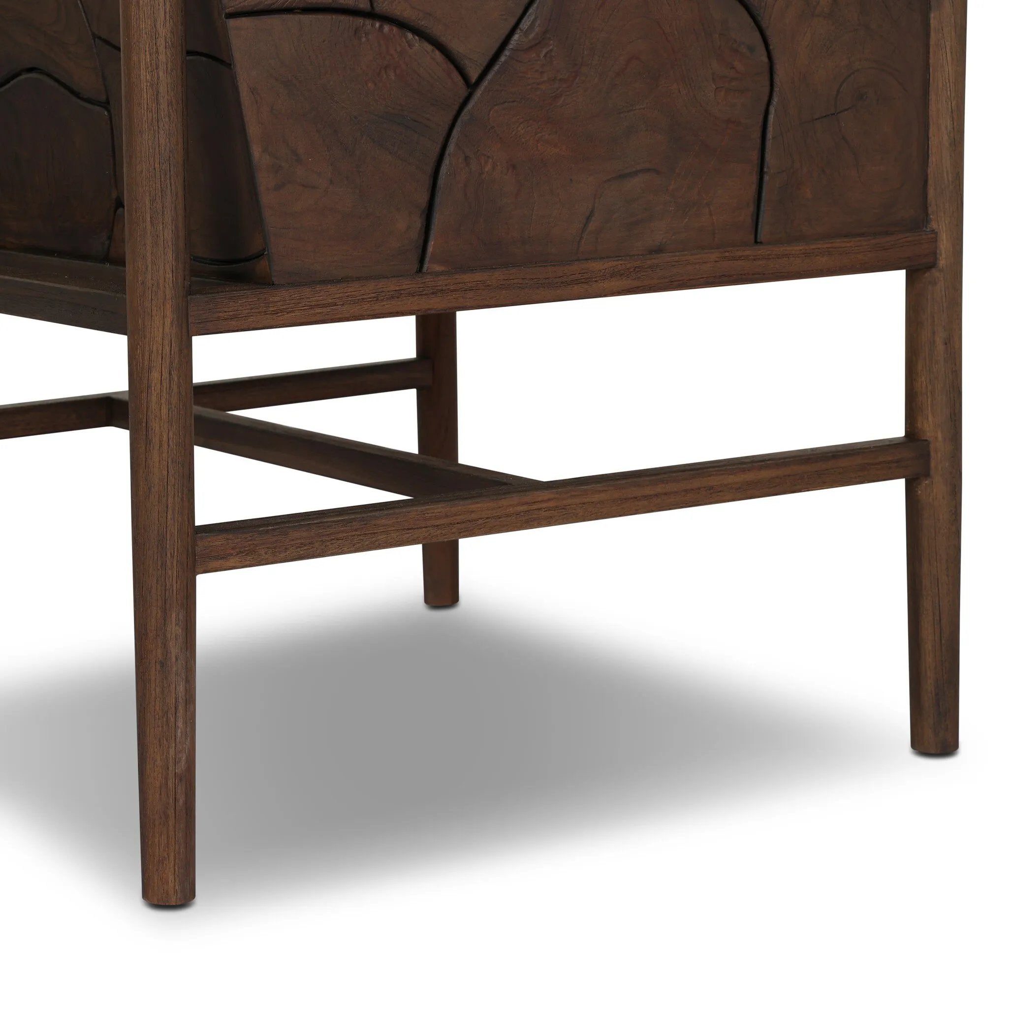 Inset panels of solid teak root are laminated to create a mosaic look against beautiful natural graining. Between angled armrests, cushioned seating is upholstered in a durable Italian fabric for an elevated look with a linen hand feel. Amethyst Home provides interior design, new home construction design consulting, vintage area rugs, and lighting in the Salt Lake City metro area.