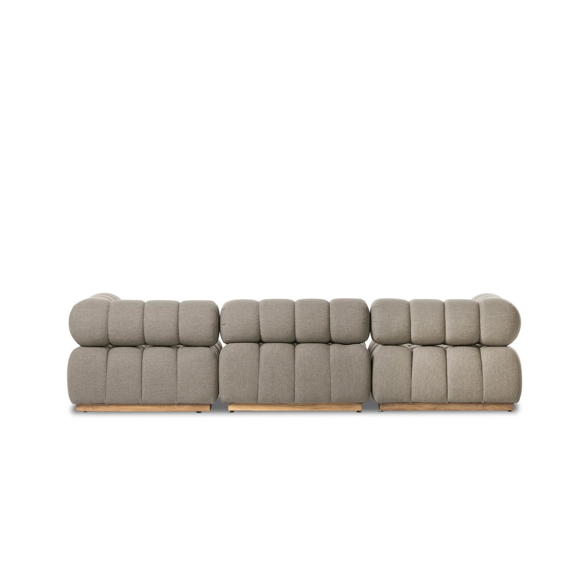 Featuring Roma Alessi Fawn Outdoor 3-Piece Sectional by Four Hands at Amethyst Home. A modern take on mid-century Italian design, soft volume and exaggerated proportions fuse for a sculpted look and playful feel. Atop a plinth-style teak base, outdoor-friendly three-piece sectional with ottoman features dramatic tufting for a padded sit, indoors and out. Cover . Amethyst Home provides interior design, new home construction design consulting, vintage area rugs, and lighting in the Tampa metro area.