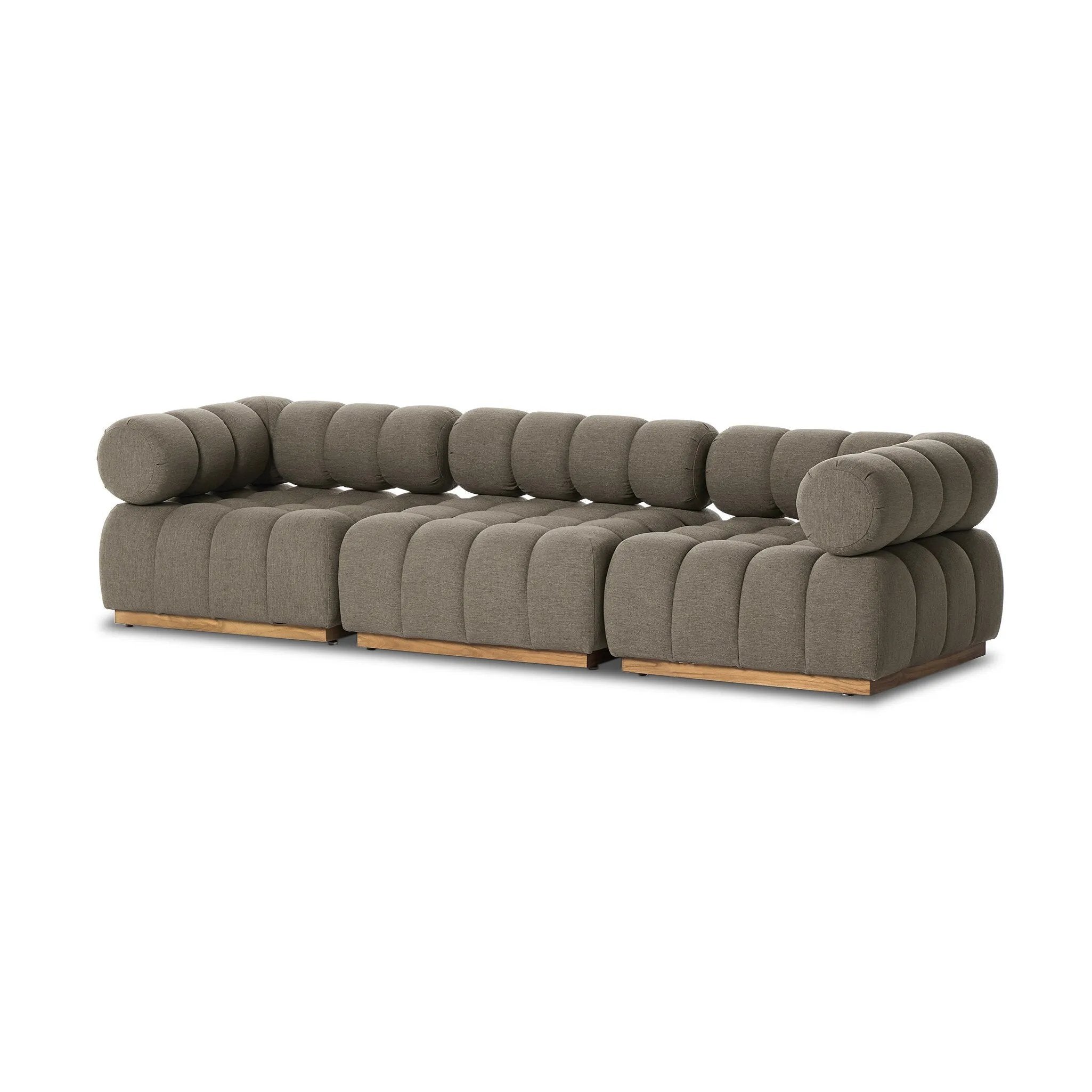 Featuring Roma Alessi Fawn Outdoor 3-Piece Sectional by Four Hands at Amethyst Home. A modern take on mid-century Italian design, soft volume and exaggerated proportions fuse for a sculpted look and playful feel. Atop a plinth-style teak base, outdoor-friendly three-piece sectional with ottoman features dramatic tufting for a padded sit, indoors and out. C. Amethyst Home provides interior design, new home construction design consulting, vintage area rugs, and lighting in the Washington metro area.