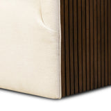 Designed with a shelter-style silhouette, this swivel chair wraps around for a seamless sit. The showstopping wood fluting adds textural contrast and organic appeal to the 360-degree swivel.As fans of clean aesthetics at Amethyst, we love the nature inspired Rory Swivel Chair - Laughlin Bone. Amethyst Home provides interior design, new home construction design consulting, vintage area rugs, and lighting in the Omaha metro area.