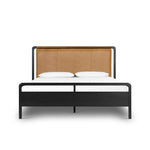 Ebony-finished oak frames a sling-style headboard made from top-grain leather, with subtly rounded edges and metal dowel detailing Amethyst Home provides interior design, new home construction design consulting, vintage area rugs, and lighting in the Charlotte metro area.