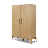 Accented with iron hardware wrapped in tan top-grain leather, light-finished oak veneer forms a clean silhouette with plenty of storage. Outset legs add an element of interest.As fans of wabi sabi materials at Amethyst, we love the optimistic inspired Rosedale Cabinet - Yucca Oak Veneer. Amethyst Home provides interior design, new home construction design consulting, vintage area rugs, and lighting in the Houston metro area.