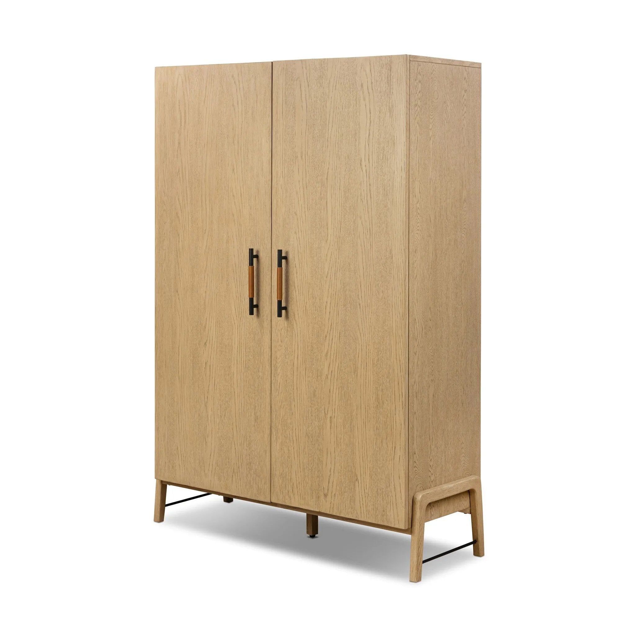 Accented with iron hardware wrapped in tan top-grain leather, light-finished oak veneer forms a clean silhouette with plenty of storage. Outset legs add an element of interest.As fans of wabi sabi materials at Amethyst, we love the optimistic inspired Rosedale Cabinet - Yucca Oak Veneer. Amethyst Home provides interior design, new home construction design consulting, vintage area rugs, and lighting in the Houston metro area.
