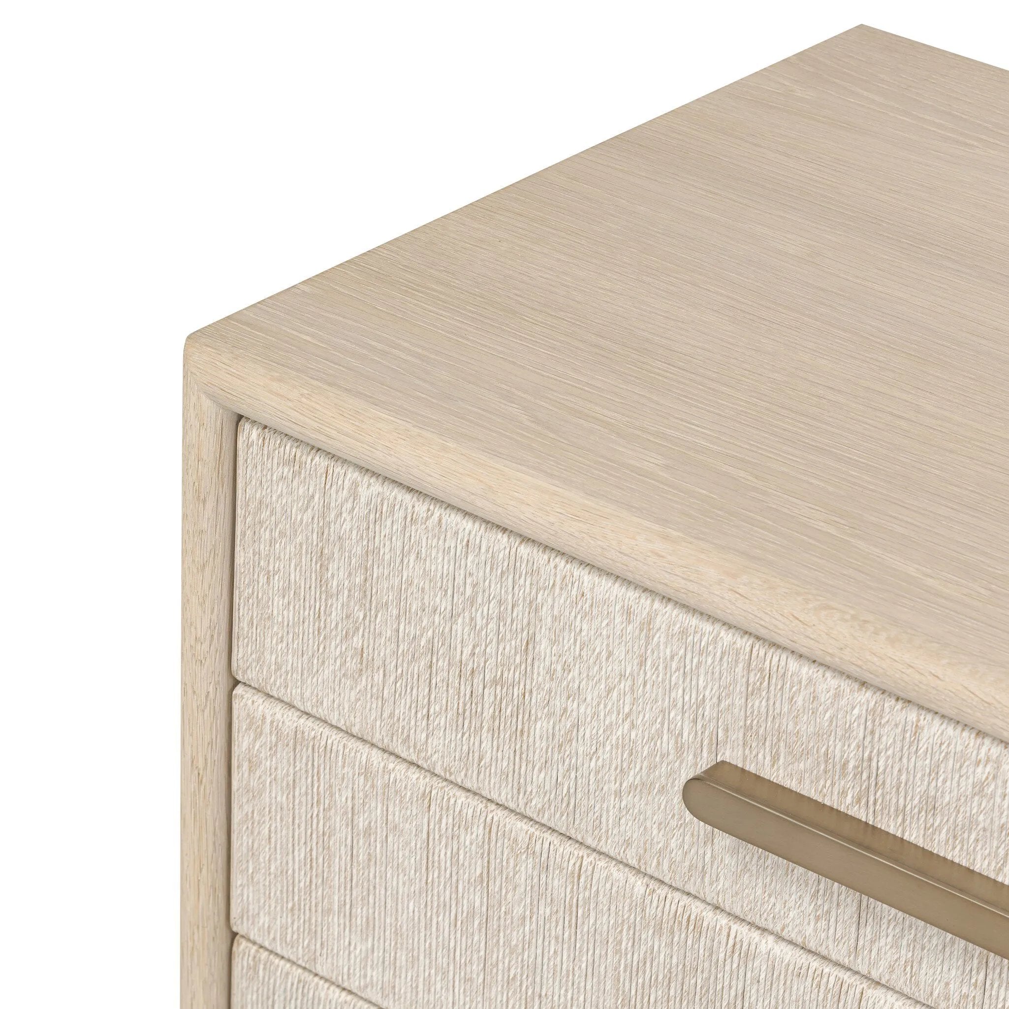 Elevate your bedside storage with a nightstand of light, natural oak. A smooth top pairs with three drawer fronts of woven paper cord for a clean, Scandinavian-inspired look that will work into your bedroom collection beautifully Amethyst Home provides interior design, new home construction design consulting, vintage area rugs, and lighting in the Houston metro area.