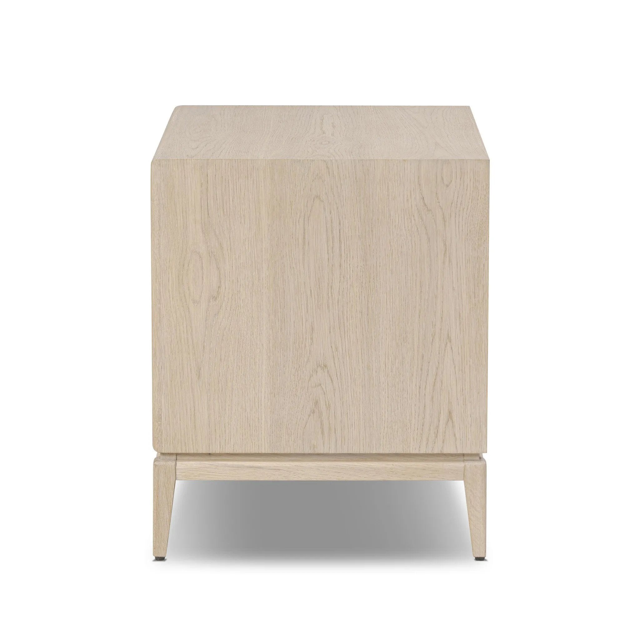 Elevate your bedside storage with a nightstand of light, natural oak. A smooth top pairs with three drawer fronts of woven paper cord for a clean, Scandinavian-inspired look that will work into your bedroom collection beautifully Amethyst Home provides interior design, new home construction design consulting, vintage area rugs, and lighting in the Tampa metro area.