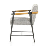 Textural grey seating upholstered in high-performance fabric exclusive to Four Hands, with angular solid oak arms and black-finished stainless steel framing.As lovers of organic modern style at Amethyst, we love the designer inspired Rowen Dining Chair - Thames Raven. Amethyst Home provides interior design, new home construction design consulting, vintage area rugs, and lighting in the Charlotte metro area.