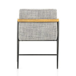 Textural grey seating upholstered in high-performance fabric exclusive to Four Hands, with angular solid oak arms and black-finished stainless steel framing.As lovers of organic modern style at Amethyst, we love the designer inspired Rowen Dining Chair - Thames Raven. Amethyst Home provides interior design, new home construction design consulting, vintage area rugs, and lighting in the Monterey metro area.