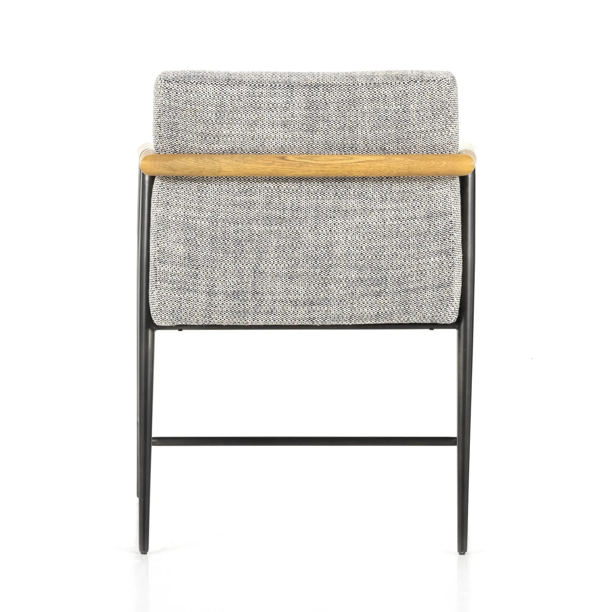 Textural grey seating upholstered in high-performance fabric exclusive to Four Hands, with angular solid oak arms and black-finished stainless steel framing.As lovers of organic modern style at Amethyst, we love the designer inspired Rowen Dining Chair - Thames Raven. Amethyst Home provides interior design, new home construction design consulting, vintage area rugs, and lighting in the Monterey metro area.