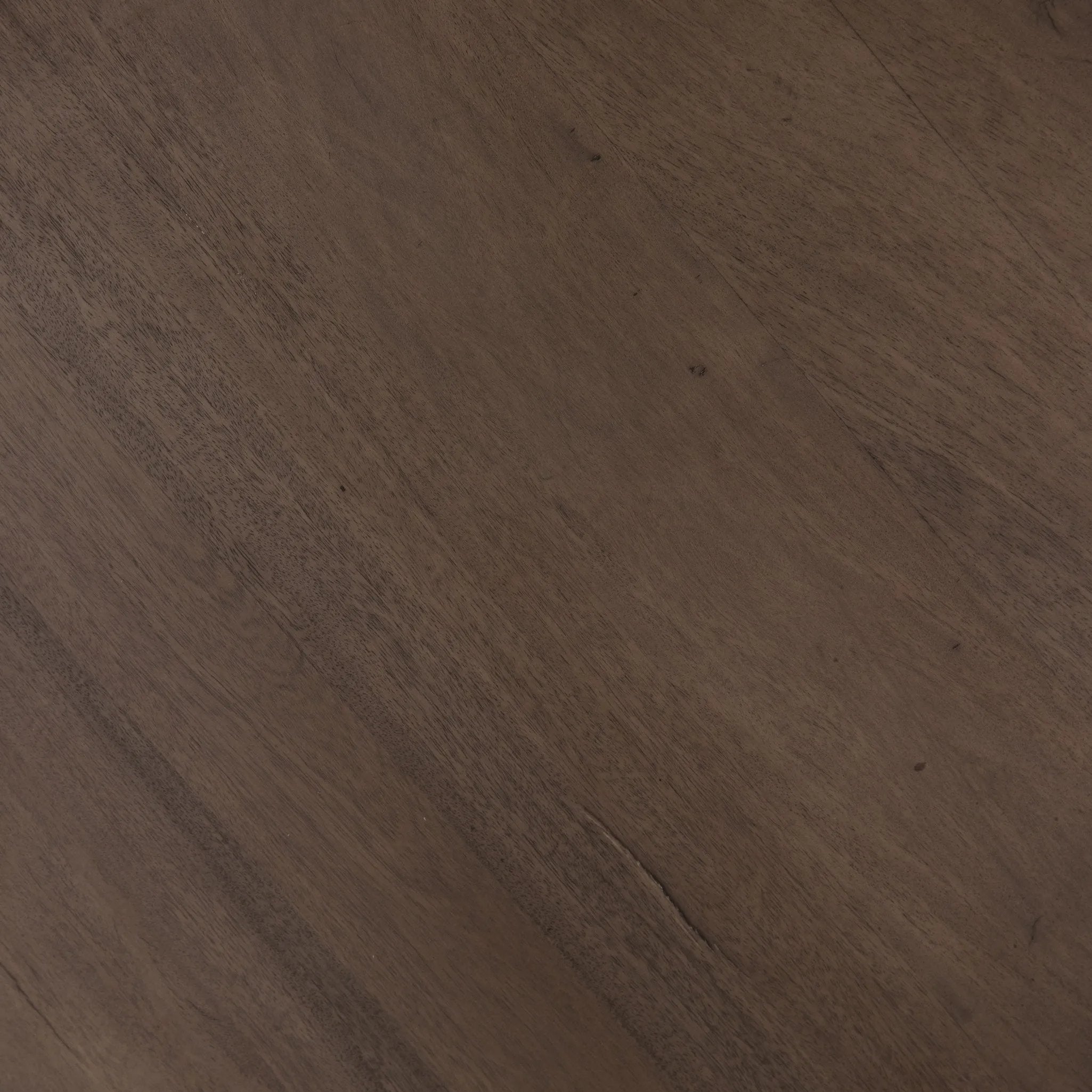 Inspired by décor in the majestic palaces of Jaipur, a conversation-starting end table is made from mixed reclaimed woods, with a rounded top and base with vertical reeding Amethyst Home provides interior design, new home construction design consulting, vintage area rugs, and lighting in the Washington metro area.