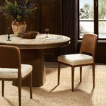 The classic material mix look you want in your dining space. Butterscotch top-grain leather with a subtle vintage look pairs with a neutral performance fabric-upholstered seat. Tapered legs and an armless silhouette look timelessly chic. Amethyst Home provides interior design, new home construction design consulting, vintage area rugs, and lighting in the Park City metro area.
